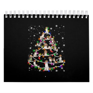 Calendário Árvore De Natal De Beagle Abrangida Pela Lâmpada