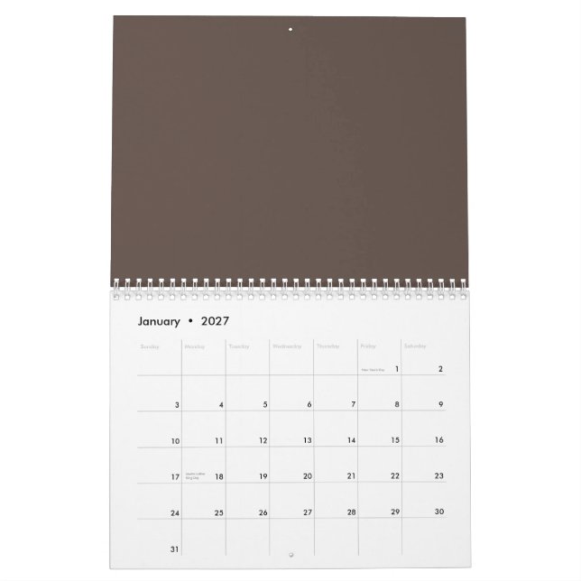Calendário Confiante contra um muro marrom Na moda (Jan 2027)