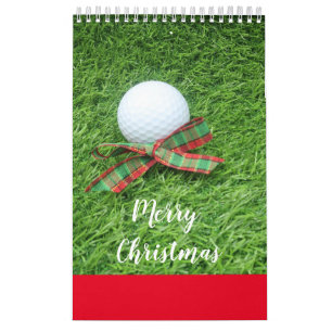 Calendário de Golfe com bola de golfe sobre grama