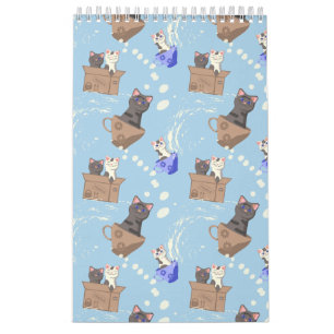 Calendário Gatos na caixa e leite cai em azul