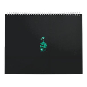 Calendário pintura de uma flor e de um peixe num fundo preto