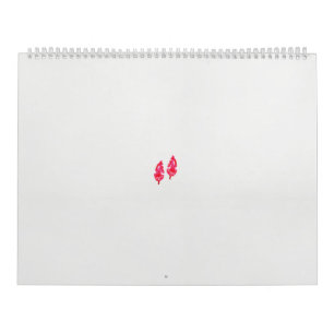 Calendário um par de folhas vermelhas sobre fundo preto