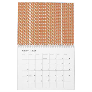 Calendário Um tapete laranja com padrão texturizado está sobr