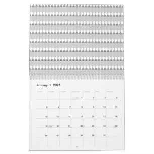 Calendário Uma cordilheira coberta de neve sob um azul claro