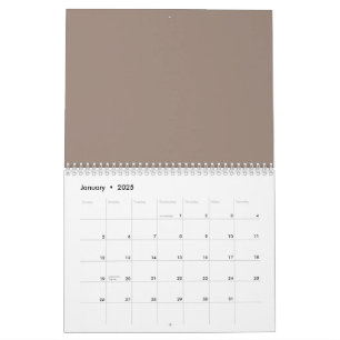 Calendário uma parede marrom com um relógio