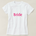Camisa nobre<br><div class="desc">Camisa de noiva adequada para ensaio, chá de panela, festa de solteira ou a qualquer momento, Shirt diz Bride em texto de fúcsia.</div>