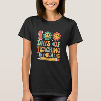 Camiseta 100th Day Teaching Tiny Humans Retro Groovy 100 Da