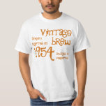 Camiseta 60º aniversário 1954 Vintage Brew White Dourado v0<br><div class="desc">Procurando um presente único de 60 anos? Aqui está uma camisa de aniversário divertida! Vintage Brew foi criada em 1954 e envelheceu até à perfeição. Uma seleção de outras t-shirts de anos de Jaclinart e vintage é mostrada abaixo. E! o texto é personalizável, portanto você pode alterar ou adicionar um...</div>