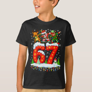 Camiseta 67 Seis Sete Meme Gen Alfa Natal Papai Noel Elfo R