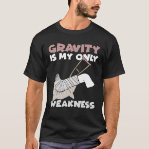 Camiseta A Gravidade É A Minha Única Fraqueza Arma Da Perna