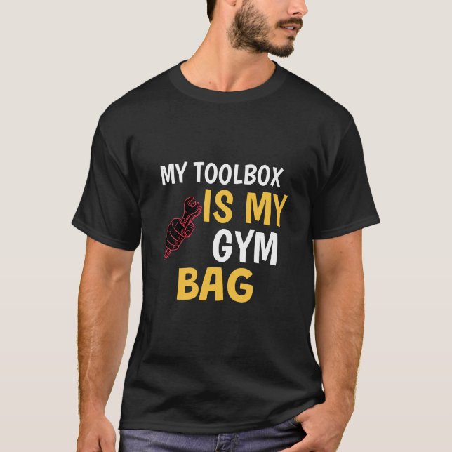 Camiseta A Minha Caixa De Ferramentas É A Minha Bolsa De Gy (Frente)
