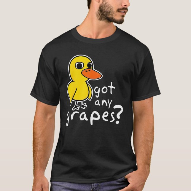 Camiseta A Música Do Pato Tem Alguma Limonada De Uva Engraç (Frente)