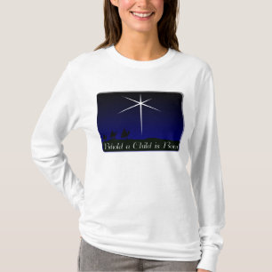 Camiseta A natividade uma criança é nascida