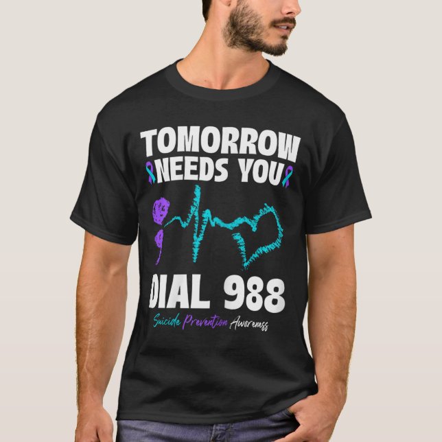 Camiseta A Prevenção Contra Suicídio 988 Amanhã Precisa De  (Frente)