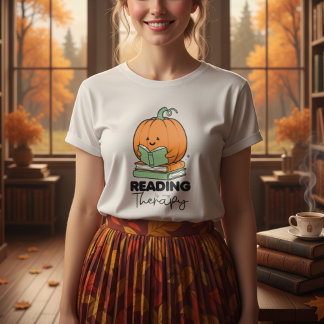 Camiseta Abóbora bonita segurando um livro, lendo em queda