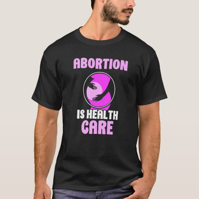 Camiseta Aborto é assistência médica Pró Aborto (Frente)