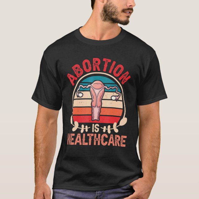 Camiseta Aborto É Saúde Pró Escolha Pró Aborto Fe (Frente)