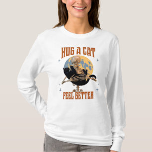 Camiseta Abraçar um gato, sentir melhor esqueleto abraçando