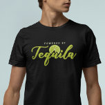 Camiseta Acionado por Tequila Verde limão Funny<br><div class="desc">Esse produto temático engraçado de tequila faria um excelente extra para sua coleção. Perfeito para qualquer um que ama mostrar sua personalidade e paixão quando está lá fora com amigos ou colegas de trabalho</div>