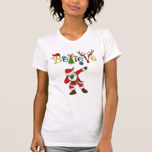 Camiseta Acredite, papai noel que golpeia um T da pose