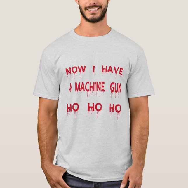 Camiseta Agora Tenho Uma Arma De Máquina Ho Ho Ho Ho (Frente)