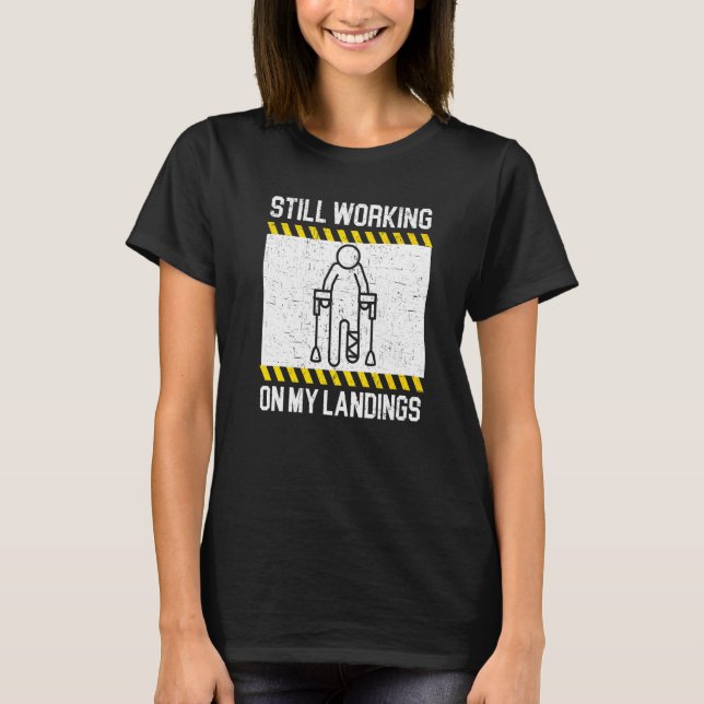 Camiseta Ainda Trabalhando Em Meus Pousos Perna Quebrada Le (Frente)