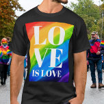 Camiseta Amor É Orgulho Arco-Íris<br><div class="desc">Esta camiseta do Orgulho é decorada com LOVE IS LOVE em letras brancas em negrito sobre um fundo arco-íris de cor d'água de vermelho, laranja, amarelo, verde, azul e roxo. Original Watercolor © Michele Davies.</div>