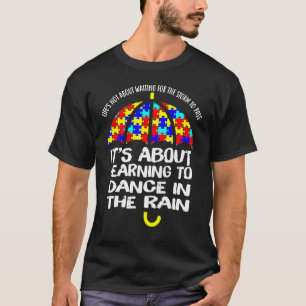 Camiseta Aprendendo a dançar na chuva citando Autismo Aware