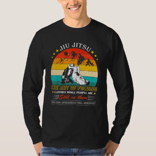 Camiseta Arte Jiu Jitsu de roupas dobráveis enquanto Pessoa