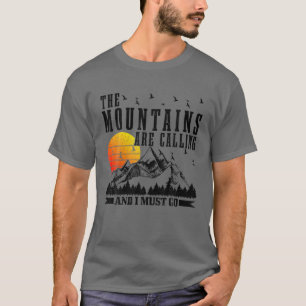 Camiseta As Montanhas Estão Ligando Para Eu Ir Caminhando A