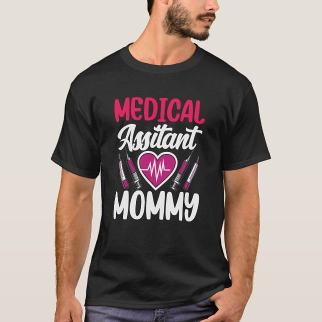 Camiseta Assistente Médico Mãe de Enfermagem Assistência de (Frente)