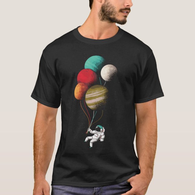 Camiseta Astronauta Flutuante Segurando Balões do Planeta (Frente)