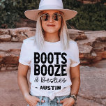 Camiseta Austin Bachelorette Boots Booze Besties Custom<br><div class="desc">The Austin Bachelorette Party Boots Booze and Besties Custom T-Shirt is perfect for any bride-to-be who wants to have a blast on her bachelorette party! This shirt features hilarious quotes about bachelorette parties, cowboy style bachelorette parties, rodeo bachelorette parties, and more. The shirt is also available in other colors and...</div>