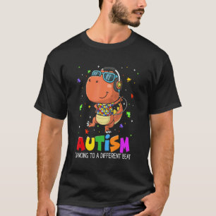 Camiseta Autismo Dançando Para Ser Um Ritmo Diferente Dinos