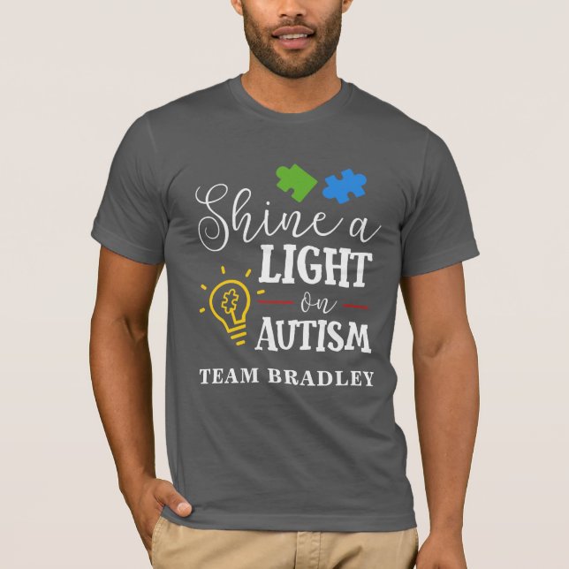 Camiseta Autismo Ilumina uma Equipe de Combinação de Luz Pe (Frente)