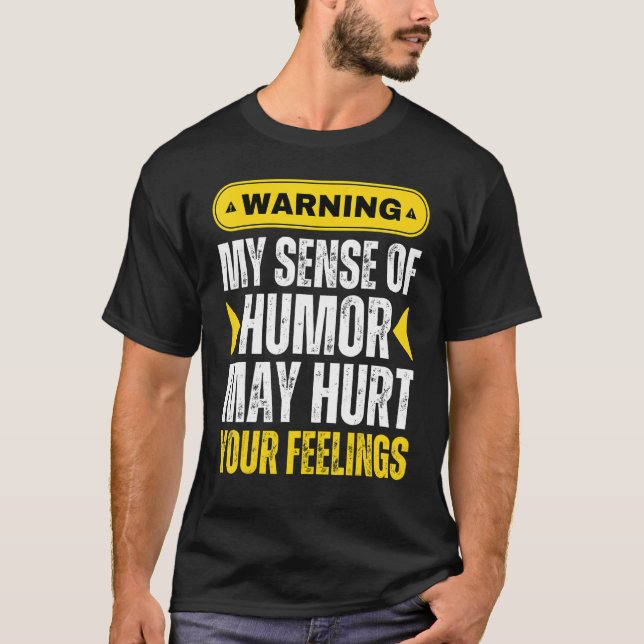 Camiseta Avisar Meu Sentido De Humor Pode Machucar Seus Sen (Frente)