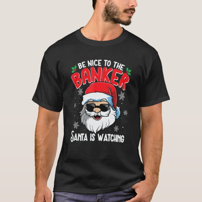 Camiseta Be Nice To The Banker Santa Is Watching   Christma (Frente)