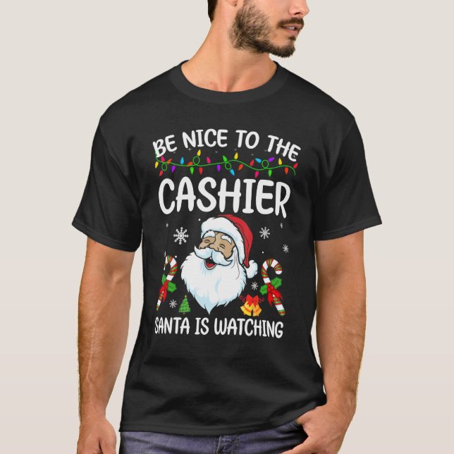 Camiseta Be Nice To The Cashier Santa Is Watching Christmas (Frente)
