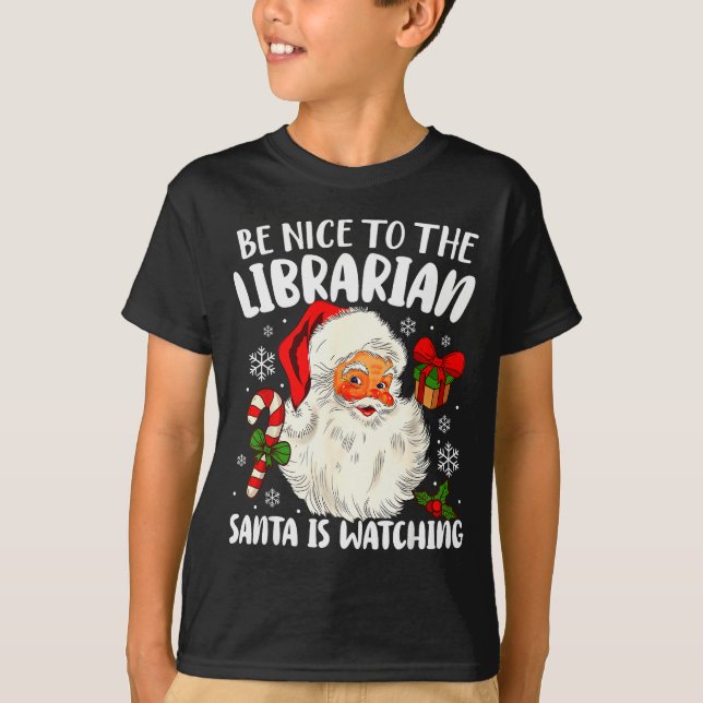 Camiseta Be Nice To The Librarian Santa Is Watching Christm (Frente)
