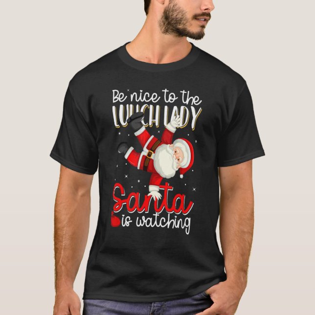 Camiseta Be Nice To The Lunch Lady Santa Is Watching Christ (Frente)