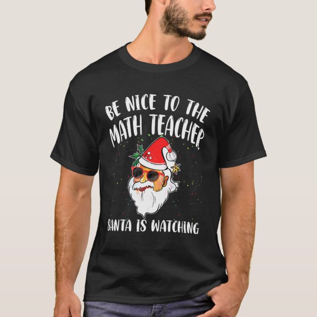 Camiseta Be Nice To The Math Teacher Santa Is Watching  Quo (Frente)