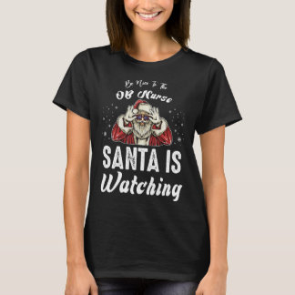 Camiseta Be Nice to The OB Nurse Santa Is Watching  Christm