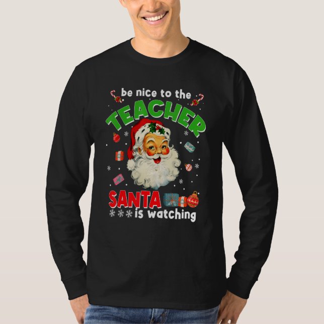 Camiseta Be Nice To The Teacher Santa Is Watching  Christma (Frente)