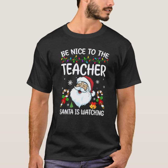 Camiseta Be Nice To The Teacher Santa Is Watching Christmas (Frente)