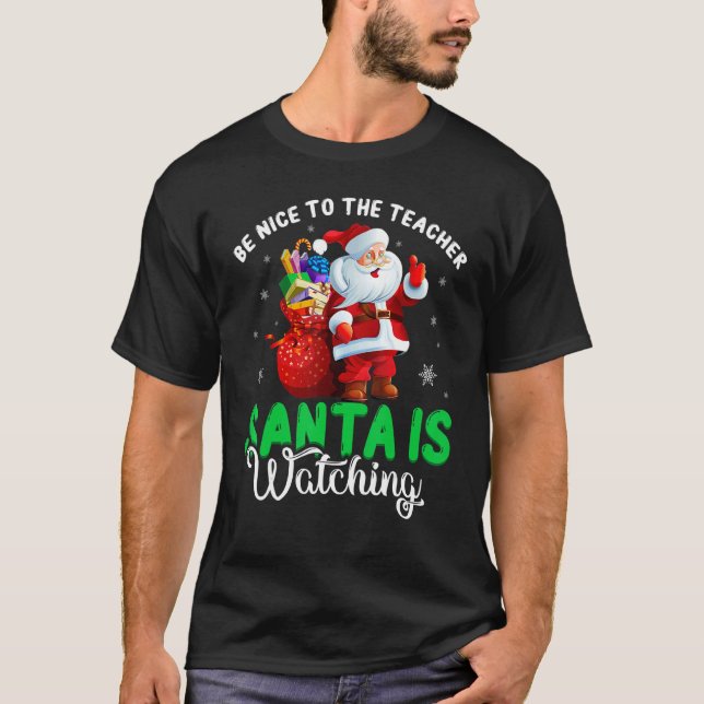 Camiseta Be Nice To The Teacher Santa Is Watching Christmas (Frente)