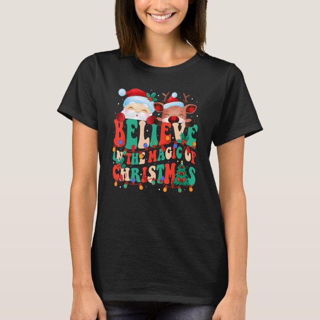 Camiseta Believe In The Magic Of Christmas Santa Reindeer   (Frente)