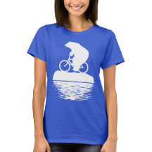 Bicicleta da equitação do urso polar no t-shirt