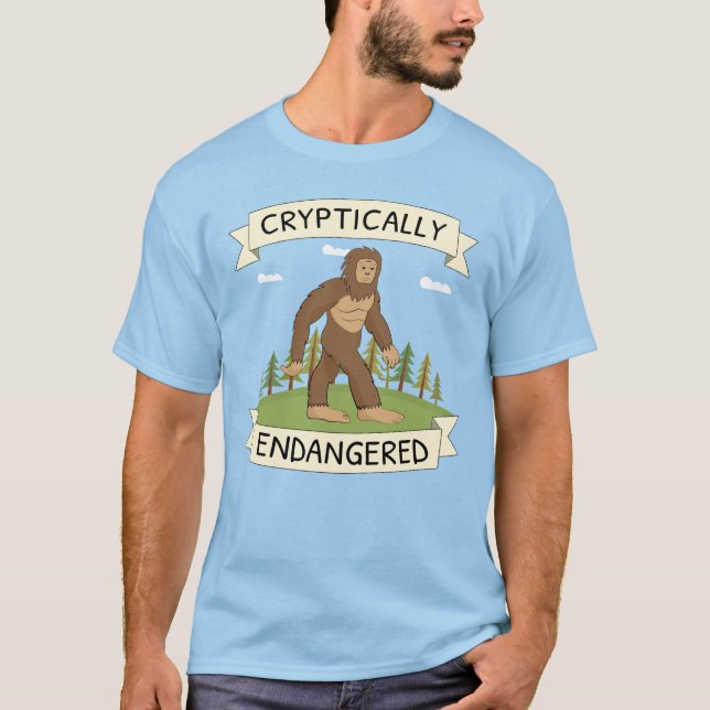Camiseta Bigfoot Engraçado Cripticamente Ameaçado (Frente)