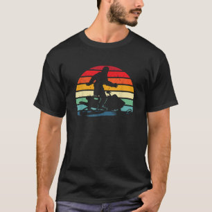 Camiseta Bigfoot pilotando moto de neve Sasquatch pilotando