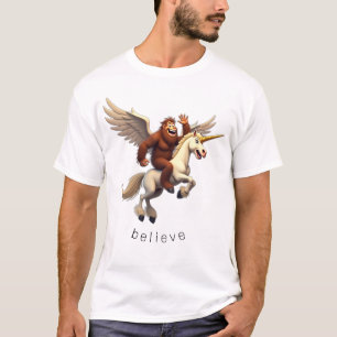 Camiseta BIGFOT RIDING A FLYING UNICORN ACREDITA fantasia
